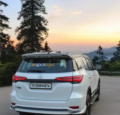 Chandigarh to Mussoorie Taxi - White toyota fortuner for